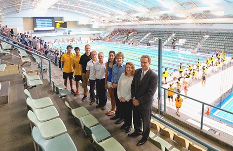 people in front of a lane pool