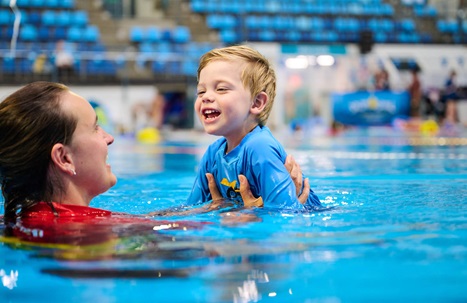 https://www.hbfstadium.com.au/images/default-source/hbf-stadium/swim/instructor-in-the-water-with-happy-young-boy-1920-x-1080.jpg?sfvrsn=e01f6be_1&Quality=High&Method=CropCropArguments&ScaleUp=true&Width=467&Height=303&Signature=193E51FEC64B6A6FB90929E755C2D38DFD84E09A