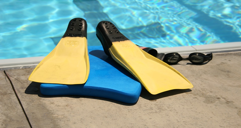 Swimming equipment resting by the pool